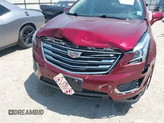 2017 Cadillac XT5 Luxury FWD z VIN 1GYKNBRS4HZ157025, wystawiony jako IAAI lot #42054534 z przebiegiem 78 276 mil mil oraz . Historia ofert i sprzedaży dostępna na DreamBid. Obrazek 6.