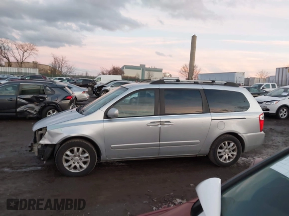 2007 Kia Sedona LX with VIN KNDMB233976172127, listed as a IAAI auction lot 41557356 with 164,383 mi miles. Bid and sale history available at carsss.com. Image 14.