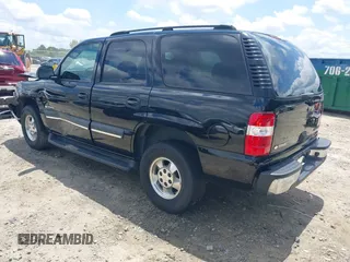 2003 Chevrolet Tahoe LS with VIN 1GNEC13V03R315463, listed as a IAAI auction lot 42518427 with 155,629 mi miles and . Bid and sale history available at DreamBid. Image 3.