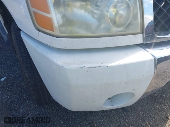 2004 Nissan Titan LE with VIN 1N6AA07A04N561241, listed as a IAAI auction lot 42180597 with 166,529 mi miles and . Bid and sale history available at DreamBid. Image 6.
