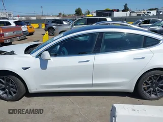 2020 Tesla Model 3 Long Range with VIN 5YJ3E1EB4LF619754, listed as a IAAI auction lot 41920422 with 82,430 mi miles and . Bid and sale history available at DreamBid. Image 13.