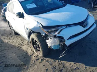 2017 Toyota RAV4 LE with VIN JTMZFREV5HJ701508, listed as a IAAI auction lot 41854606 with 175,000 mi miles and . Bid and sale history available at DreamBid. Image 6.