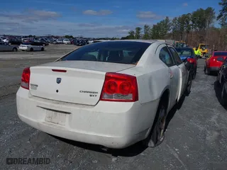 2009 Dodge Charger SXT with VIN 2B3KA33V19H593666, listed as a IAAI auction lot 41573349 with 239,264 mi miles. Bid and sale history available at carsss.com. Image 4.