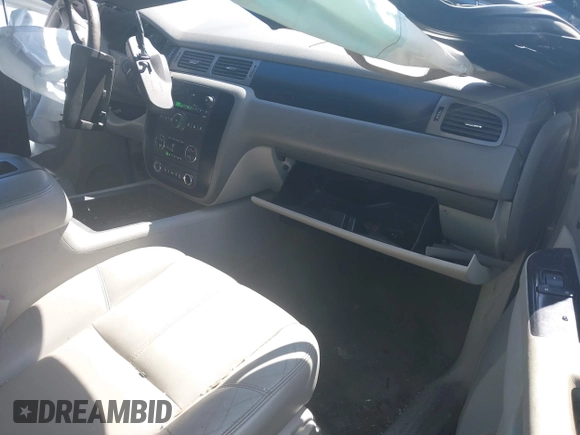 2012 Chevrolet Tahoe LT with VIN 1GNSKBE09CR100385, listed as a IAAI auction lot 41743325 with 185,174 mi miles and . Bid and sale history available at DreamBid. Image 5.