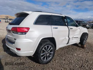 2017 Jeep Grand Cherokee Overland with VIN 1C4RJFCG7HC707767, listed as a Copart auction lot 82345154 with 96,374 mi miles and Salvage Title. Bid and sale history available at carsss.com. Image 3.