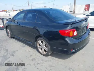 2009 Toyota Corolla XRS with VIN 1NXBE40EX9Z100623, listed as a IAAI auction lot 42032138 with 183,901 mi miles. Bid and sale history available at carsss.com. Image 3.