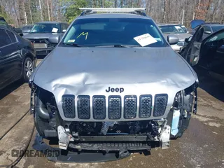 2020 Jeep Cherokee Altitude with VIN 1C4PJMLN6LD541335, listed as a IAAI auction lot 41750648 with 66,880 mi miles. Bid and sale history available at carsss.com. Image 13.