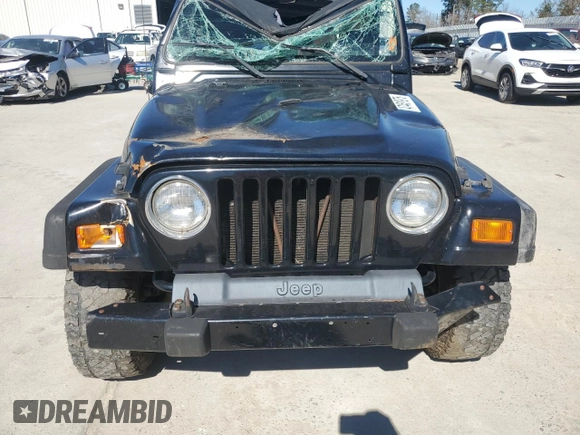 2001 Jeep Wrangler Sport with VIN 1J4FA49S51P337995, listed as a Copart auction lot 47461975 with 160,305 mi miles and Salvage Title. Bid and sale history available at carsss.com. Image 5.