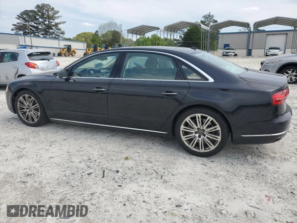 2015 Audi A8 L 4.0T with VIN WAU32AFD9FN024605, listed as a Copart auction lot 52086125 with 70,730 mi miles and Salvage Title. Bid and sale history available at carsss.com. Image 2.