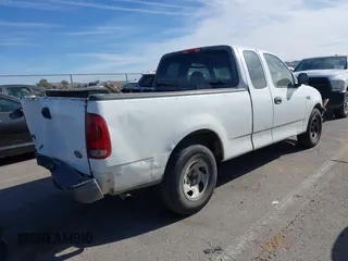 2003 Ford F-150 XL with VIN 1FTRX17213NA81064, listed as a IAAI auction lot 41796923 with 339,333 mi miles. Bid and sale history available at carsss.com. Image 4.