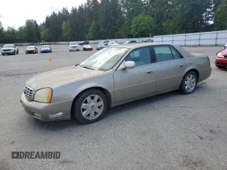 2004 Cadillac DeVille DTS z VIN 1G6KF579X4U212415, wystawiony jako Copart lot #58005555 z przebiegiem 97 663 mil mil oraz Tytuł czysty. Historia ofert i sprzedaży dostępna na DreamBid. Obrazek 1.