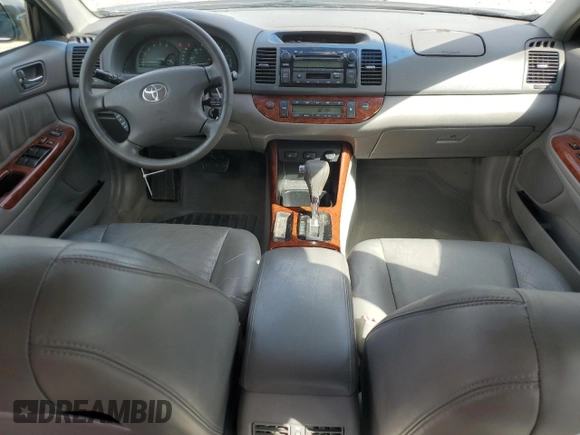 2003 Toyota Camry LE with VIN 4T1BE30K43U724778, listed as a Copart auction lot 53515605 with 176,568 mi miles and Salvage Title. Bid and sale history available at DreamBid. Image 8.