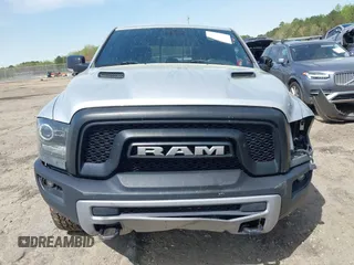 2015 Ram 1500 Rebel z VIN 1C6RR7YT0FS751334, wystawiony jako IAAI lot #41933040 z przebiegiem 167 336 mil mil oraz . Historia ofert i sprzedaży dostępna na DreamBid. Obrazek 13.