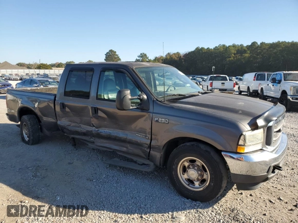 2003 Ford Super Duty F-250 XL with VIN 1FTNW20F73EB02536, listed as a Copart auction lot 77330394 with 170,102 mi miles and Salvage Title. Bid and sale history available at carsss.com. Image 4.