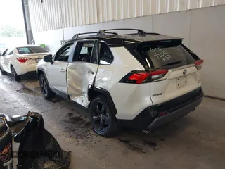2021 Toyota RAV4 Hybrid XSE with VIN 4T3E6RFV8MU046348, listed as a IAAI auction lot 40520896 with 53,312 mi miles and . Bid and sale history available at DreamBid. Image 3.