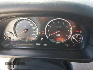 2014 BMW M5 z VIN WBSFV9C53ED594132, wystawiony jako Copart lot #67114384 z przebiegiem 89 020 mil mil oraz Szkoda całkowita • Salvage title. Historia ofert i sprzedaży dostępna na DreamBid. Obrazek 9.