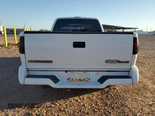 1995 GMC Sonoma SLS z VIN 1GTCS1948S8533169, wystawiony jako Copart lot #58241305 z przebiegiem 192 037 mil mil oraz Tytuł czysty. Historia ofert i sprzedaży dostępna na DreamBid. Obrazek 6.