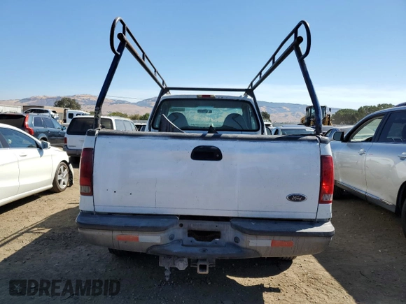 2001 Ford F-250 XL z VIN 3FTNF20L91MA70668, wystawiony jako Copart lot #70342064 z przebiegiem 190 065 mil mil oraz Szkoda całkowita • Salvage title. Historia ofert i sprzedaży dostępna na DreamBid. Obrazek 6.