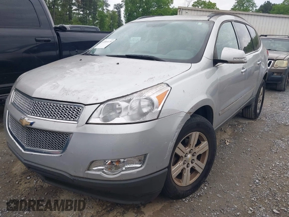 2012 Chevrolet Traverse 1LT with VIN 1GNKRGED5CJ255266, listed as a IAAI auction lot 42093175 with 103,730 mi miles and . Bid and sale history available at DreamBid. Image 2.