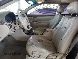 1999 Toyota Solara SE z VIN 2T1CF22P4XC171139, wystawiony jako Copart lot #58728195 z przebiegiem 148 703 mil mil oraz Szkody całkowita. Historia ofert i sprzedaży dostępna na DreamBid. Obrazek 7.