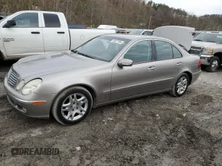 2003 Mercedes-Benz E-Class 3.2L with VIN WDBUF65J23A297936, listed as a Copart auction lot 80877004 with 214,478 mi miles and Salvage Title. Bid and sale history available at carsss.com. Image 1.