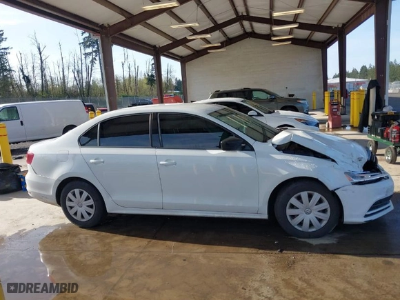 2016 Volkswagen Jetta Sedan 1.4T S with VIN 3VW267AJXGM215994, listed as a IAAI auction lot 41993650 with 130,988 mi miles. Bid and sale history available at carsss.com. Image 13.