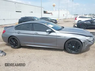 2014 BMW 6 Series 650i z VIN WBA6B2C55ED128934, wystawiony jako IAAI lot #42070641 z przebiegiem 102 597 mil mil oraz . Historia ofert i sprzedaży dostępna na DreamBid. Obrazek 13.