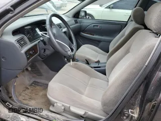 2001 Toyota Camry LE z VIN JT2BF22K010295564, wystawiony jako Copart lot #55111755 z przebiegiem 379 337 mil mil oraz Szkody całkowita. Historia ofert i sprzedaży dostępna na DreamBid. Obrazek 7.