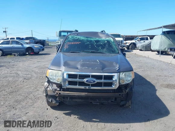 2011 Ford Escape XLT with VIN 1FMCU0D79BKB79697, listed as a IAAI auction lot 41265677 with 138,026 mi miles. Bid and sale history available at carsss.com. Image 6.