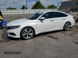 2019 Honda Accord Touring z VIN 1HGCV2F93KA018572, wystawiony jako Copart lot #58381615 z przebiegiem 64 440 mil mil oraz Szkoda całkowita • Salvage title. Historia ofert i sprzedaży dostępna na DreamBid. Obrazek 1.