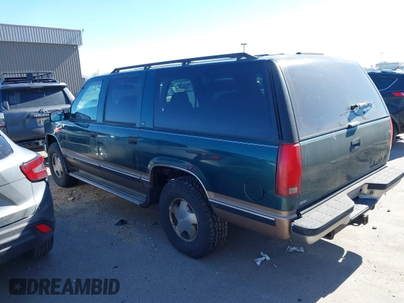 1997 Chevrolet Suburban with VIN 3GNFK16R9VG184722, listed as a IAAI auction lot 41662635 with 176,652 mi miles. Bid and sale history available at carsss.com. Image 3.