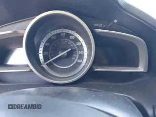 2015 Mazda 3 i Grand Touring z VIN 3MZBM1M73FM145336, wystawiony jako IAAI lot #42227676 z przebiegiem Nie podano mil oraz . Historia ofert i sprzedaży dostępna na DreamBid. Obrazek 7.