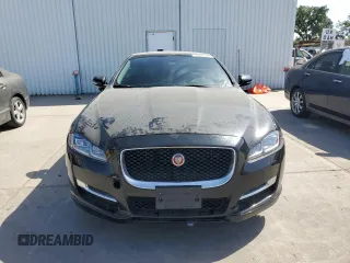 2016 Jaguar XJ R-Sport with VIN SAJWA1C70G8W02383, listed as a Copart auction lot 54580845 with 43,719 mi miles and Salvage Title. Bid and sale history available at DreamBid. Image 5.