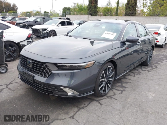 2024 Honda Accord Touring with VIN 1HGCY2F82RA070008, listed as a IAAI auction lot 42027911 with 13,878 mi miles and . Bid and sale history available at DreamBid. Image 2.