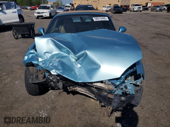 2001 Mazda MX-5 Miata z VIN JM1NB353910216600, wystawiony jako Copart lot #50916465 z przebiegiem Nie podano mil oraz Szkoda całkowita • Salvage title. Historia ofert i sprzedaży dostępna na DreamBid. Obrazek 5.