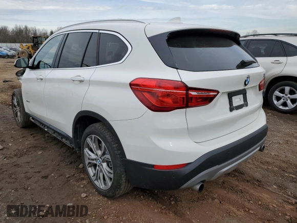 2016 BMW X1 xDrive28i with VIN WBXHT3C36GP884211, listed as a Copart auction lot 41121133 with 62,282 mi miles. Bid and sale history available at carsss.com. Image 2.