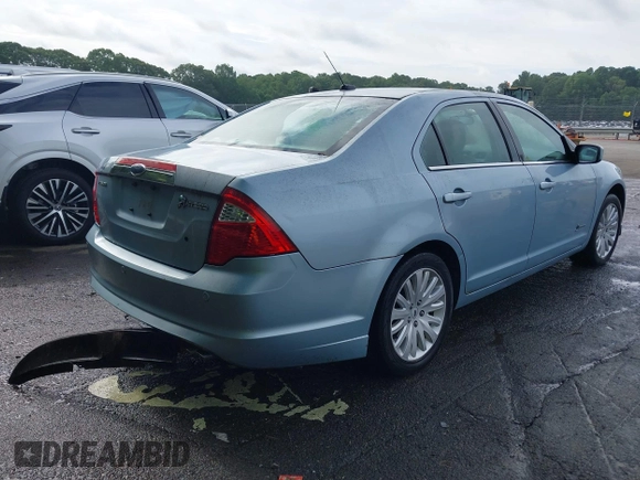 2010 Ford Fusion Hybrid с VIN 3FADP0L31AR287178, выставлен на аукционе IAAI как лот 42471647 с пробегом 104 108 миль миль и . История ставок и продаж доступна на DreamBid. Изображение 4.