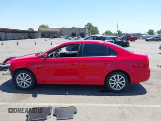 2013 Volkswagen Jetta SE with VIN 3VWDP7AJ4DM278719, listed as a IAAI auction lot 42304489 with 147,857 mi miles and . Bid and sale history available at DreamBid. Image 14.