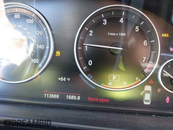 2015 BMW 5 Series 528i with VIN WBA5A5C56FD512769, listed as a IAAI auction lot 40832378 with 113,669 mi miles. Bid and sale history available at carsss.com. Image 7.