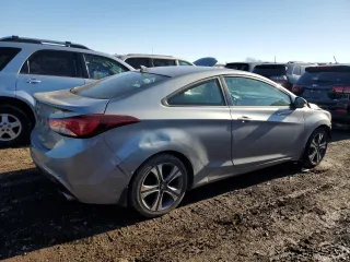 2014 Hyundai Elantra z VIN KMHDH6AH0EU028362, wystawiony jako Copart lot #50162445 z przebiegiem 113 782 mil mil oraz Szkody całkowita. Historia ofert i sprzedaży dostępna na DreamBid. Obrazek 3.