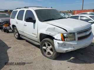 2007 Chevrolet Tahoe LTZ with VIN 1GNFC13007R139710, listed as a IAAI auction lot 41899509 with 215,004 mi miles and . Bid and sale history available at DreamBid. Image 1.