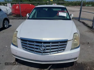 2006 Cadillac DTS 1SD z VIN 1G6KD57Y06U208812, wystawiony jako IAAI lot #42233924 z przebiegiem 120 244 mil mil oraz . Historia ofert i sprzedaży dostępna na DreamBid. Obrazek 6.