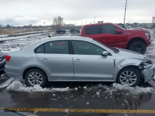 2011 Volkswagen Jetta Sedan TDI with VIN 3VWLL7AJ8BM048279, listed as a IAAI auction lot 41577283 with 153,693 mi miles. Bid and sale history available at carsss.com. Image 13.