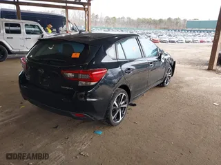 2020 Subaru Impreza with VIN 4S3GTAA64L1716459, listed as a IAAI auction lot 41673940 with 29,929 mi miles. Bid and sale history available at carsss.com. Image 4.