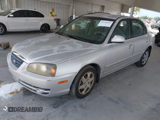 2005 Hyundai Elantra GLS with VIN KMHDN46D05U987330, listed as a IAAI auction lot 42520631 with 244,727 mi miles and . Bid and sale history available at DreamBid. Image 2.
