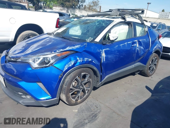 2019 Toyota C-HR XLE with VIN JTNKHMBX5K1043079, listed as a IAAI auction lot 41813367 with 77,879 mi miles and . Bid and sale history available at DreamBid. Image 21.
