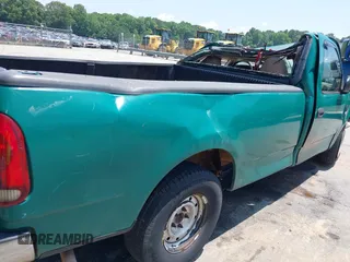 2001 Ford F-150 XL with VIN 1FTRF17WX1KB75142, listed as a IAAI auction lot 42450523 with 326,430 mi miles and . Bid and sale history available at DreamBid. Image 14.