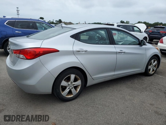 2013 Hyundai Elantra GLS z VIN 5NPDH4AE9DH382677, wystawiony jako Copart lot #64910834 z przebiegiem 209 074 mil mil oraz Nie do naprawy. Historia ofert i sprzedaży dostępna na DreamBid. Obrazek 3.