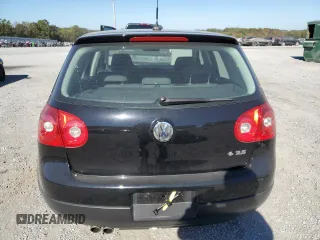 2009 Volkswagen Rabbit S with VIN WVWDA71K59W147903, listed as a Copart auction lot 76706654 with 73,297 mi miles and Salvage title. Bid and sale history available at DreamBid. Image 6.