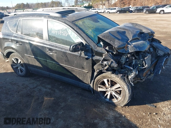 2018 Toyota RAV4 XLE with VIN 2T3RFREV2JW811214, listed as a IAAI auction lot 41458588 with 236,346 mi miles. Bid and sale history available at carsss.com. Image 1.